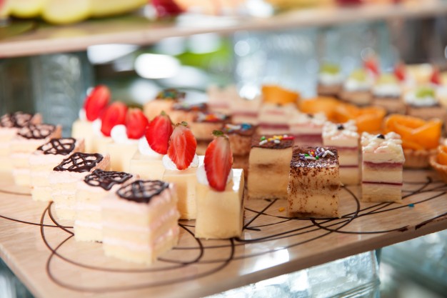 delicious-mini-cakes-buffet-table_1262-1801