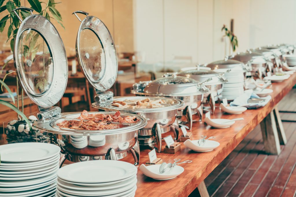 Selective focus point on Catering buffet in hotel restaurant - Vintage filter effect